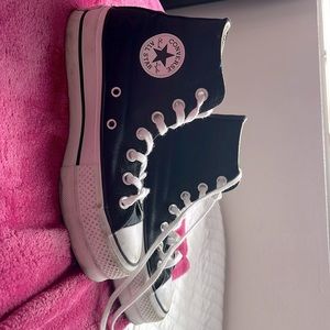 Come by these black platform converse for $30!
